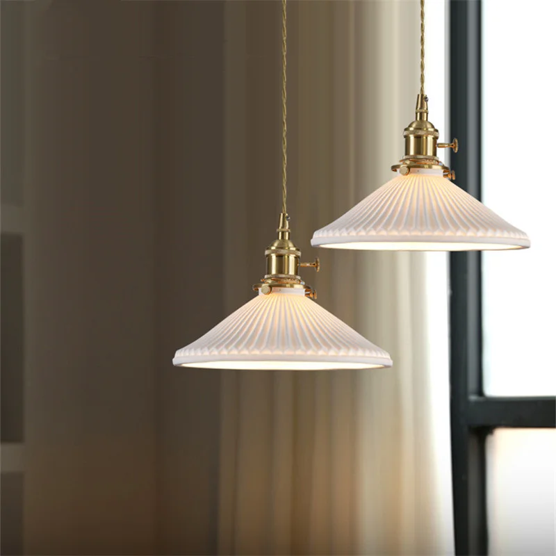 PLLY Скандинавский латунный подвесной светильник LED Современные простые креативные керамические лампы и люстры для домашней столовой Спальни Изображение 2
